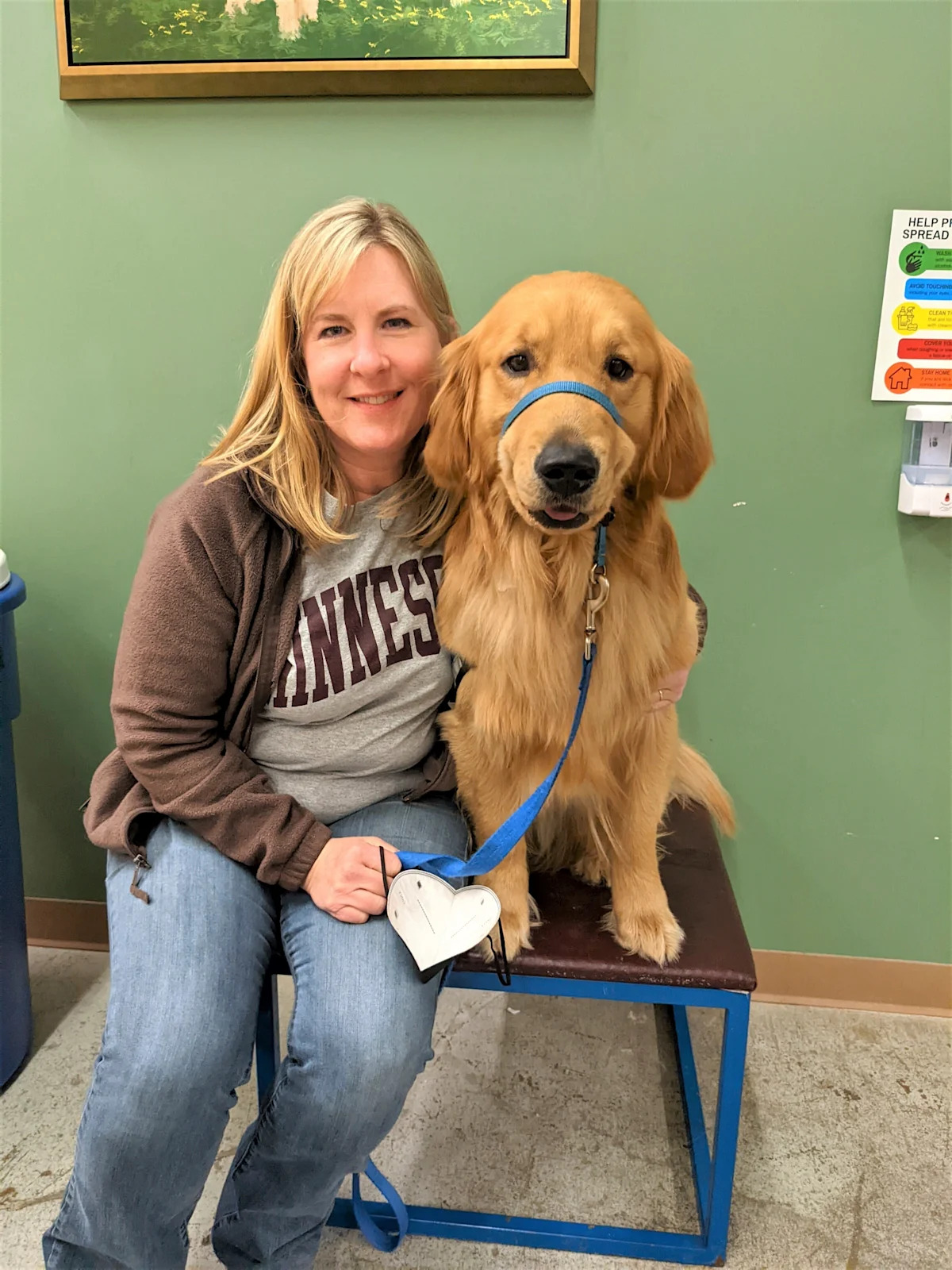 A slain Minnesota lawmaker’s beloved dog, Gilbert, stays with her as she and her spouse lie in state