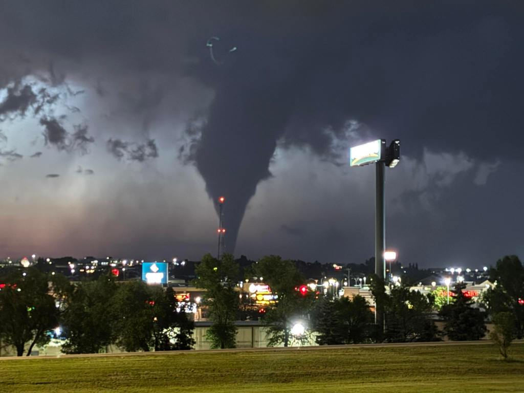 Eerie tornadoes bring haunting sights along darkened North Dakota horizons as nightfall looms