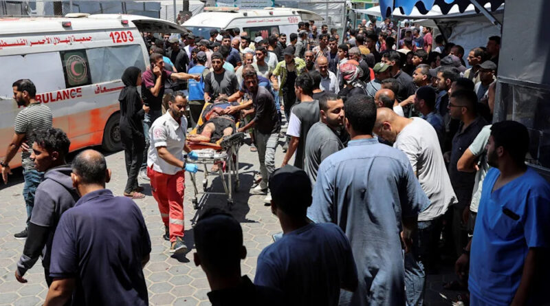 Israeli strike at Gaza market kills 18 Palestinians, doctor and witnesses say