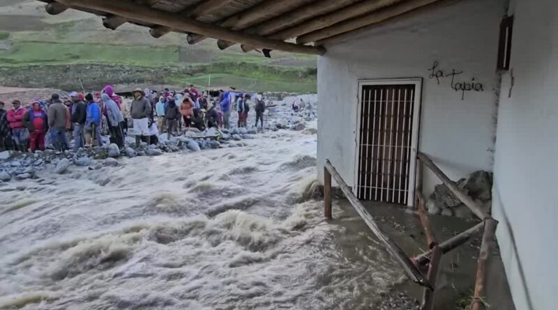 Swollen river washes away homes in Venezuela