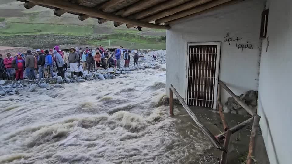 Swollen river washes away homes in Venezuela