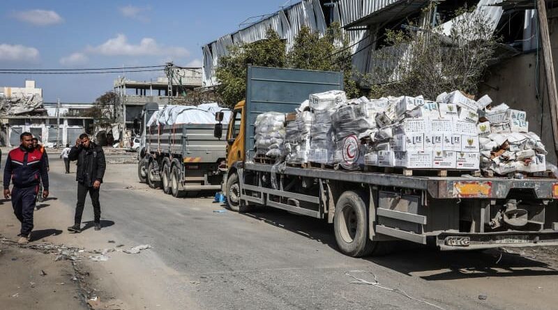 Around 100 aid lorries enter Gaza as Israel begins ‘tactical pause’
