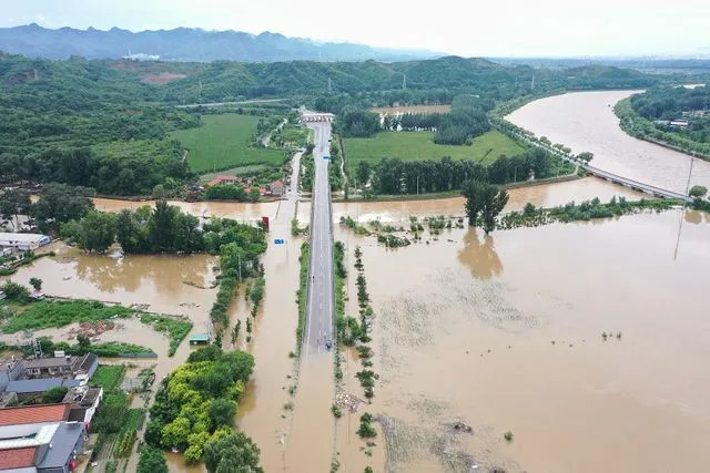 At Least 38 Dead and 80,000 Evacuated as Extreme Flooding Hits China: Reports