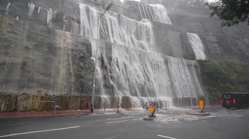 Intense rain creates a waterfall in Hong Kong