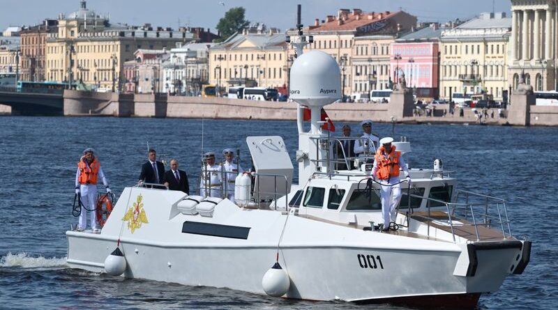 Ukrainian drones target St Petersburg as Putin attends scaled-down Navy Day