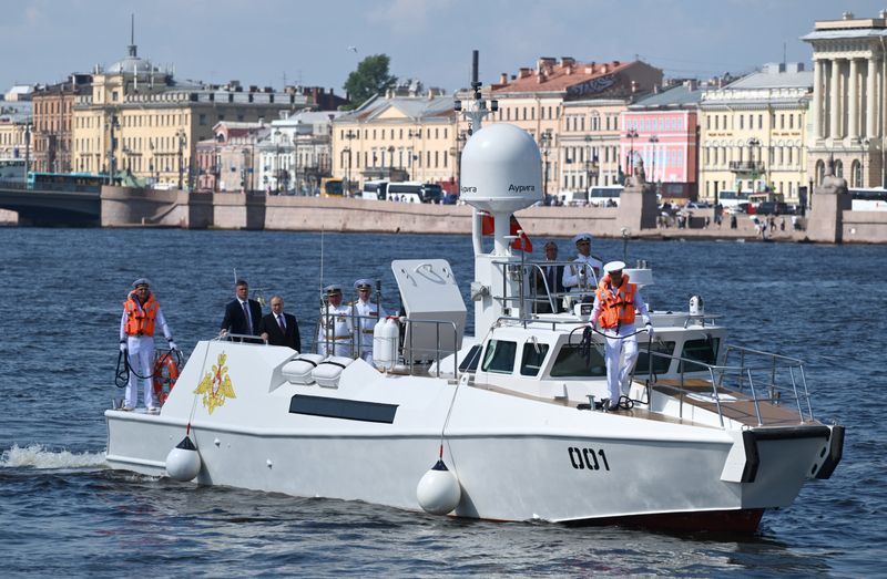 Ukrainian drones target St Petersburg as Putin attends scaled-down Navy Day