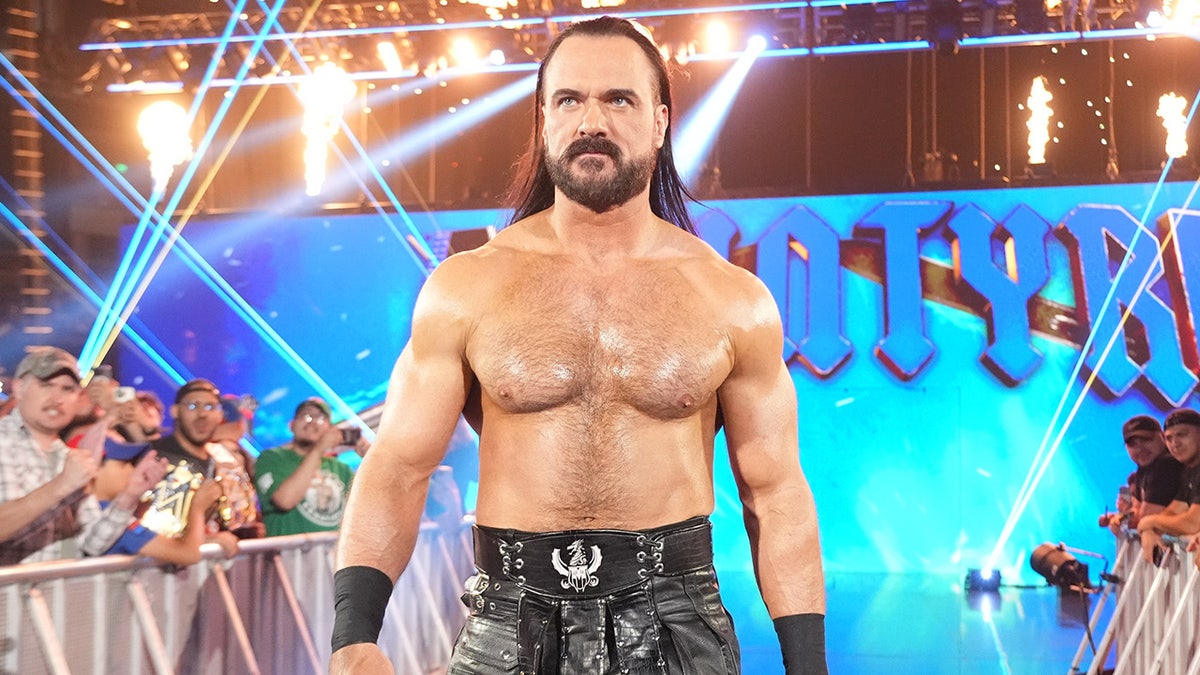 WWE star Drew McIntyre dishes on how he finally got his ‘bored at work’ shirt made