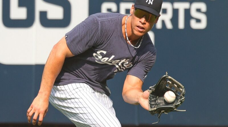 Yankees’ Aaron Judge works on outfield drills with Giancarlo Stanton